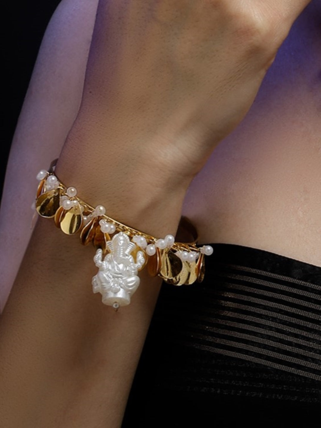 Gold and White Ganpathi Bracelets from Dugristyle Ruhaniyat By Dugran