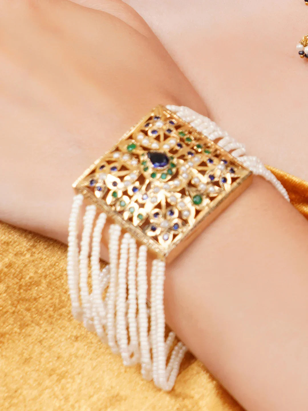Peacock inspired Jadau bracelet with Pearl Layers
