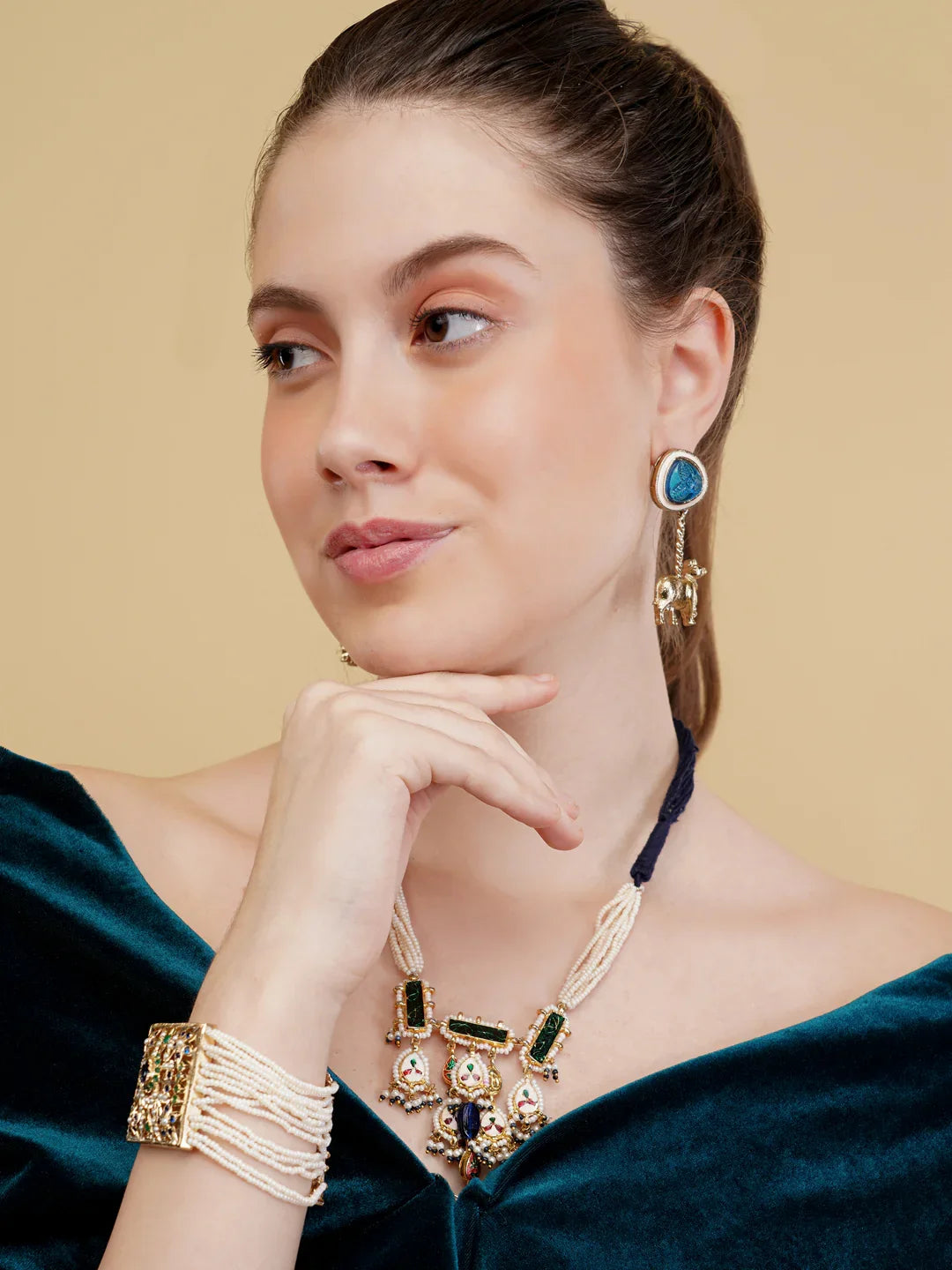 Peacock inspired Jadau bracelet with Pearl Layers