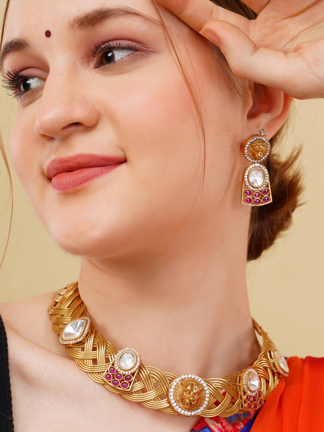 Maroon and Gold Tiger shape inspired choker with earrings having moissanite stones from Dugristyle Ruhaniyat By Dugran