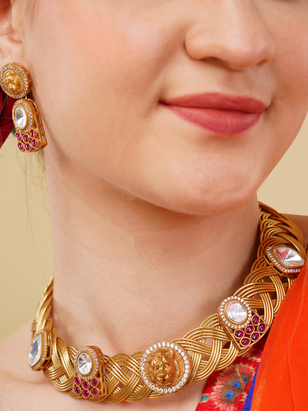 Maroon and Gold Tiger shape inspired choker with earrings having moissanite stones from Dugristyle Ruhaniyat By Dugran