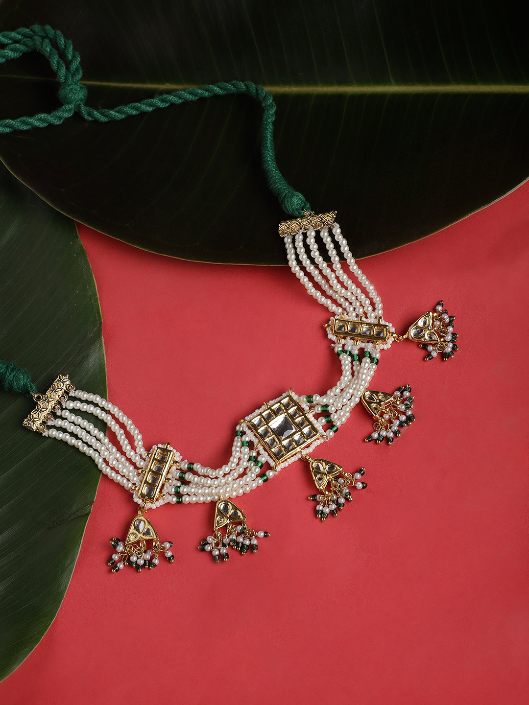 Traditional pearl choker necklace with hanging jhumka drops and green cord._10