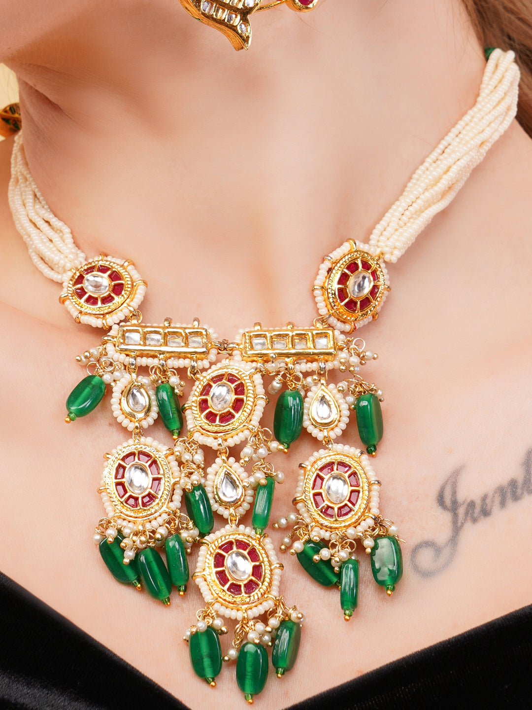 Kundan Necklace with Faux Ruby stones touch and pearls strings used with handmade dori