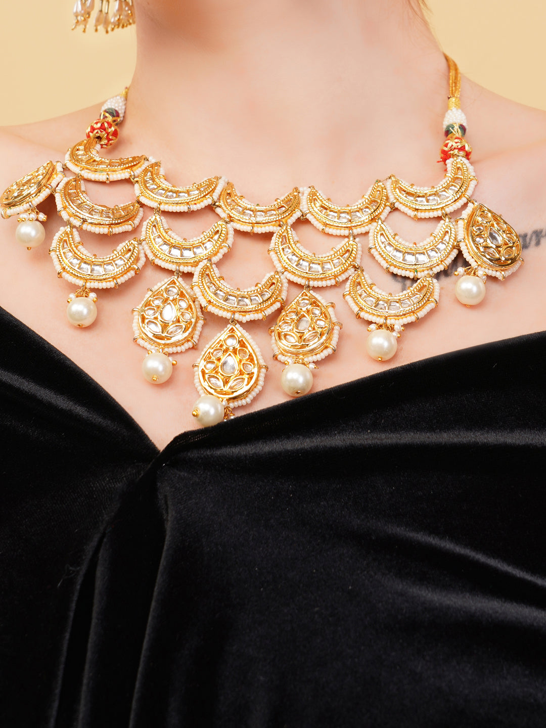 Gold and Cream Kundan Necklace with chand shaped tikras brought togather to forma masterpiece from Dugristyle Ruhaniyat By Dugran