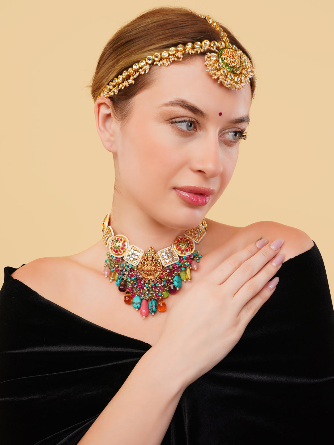 Temple Necklace with kundan tikras and mouthful of hangings to give a wholesome look