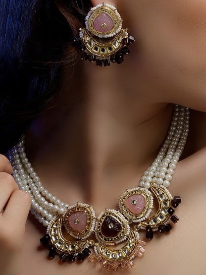 Kundan Jewellery Set with Pearls Strings and Carved Stones
