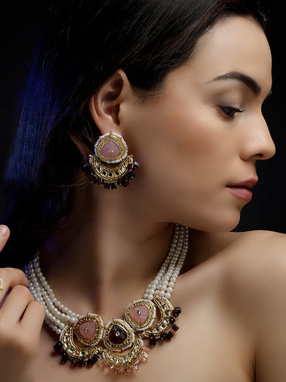 Kundan Jewellery Set with Pearls Strings and Carved Stones