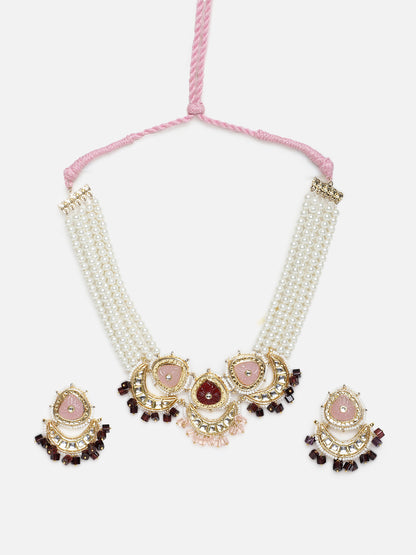 Kundan Jewellery Set with Pearls Strings and Carved Stones