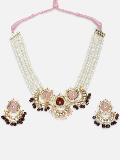 Kundan Jewellery Set with Pearls Strings and Carved Stones